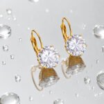 siknakit-crystal-drop-zlati-viseci-uhani-s-cirkonom-odsevna-podlaga
